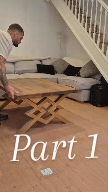 Person beside a geometric timber table in a room; “Part 1” overlay.