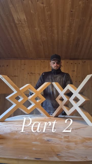 Person behind geometric timber frames at a workbench; “Part 2” overlay.